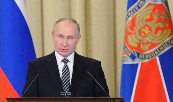 弗拉基米尔·普京(Vladimir Putin)穿着西装和领带