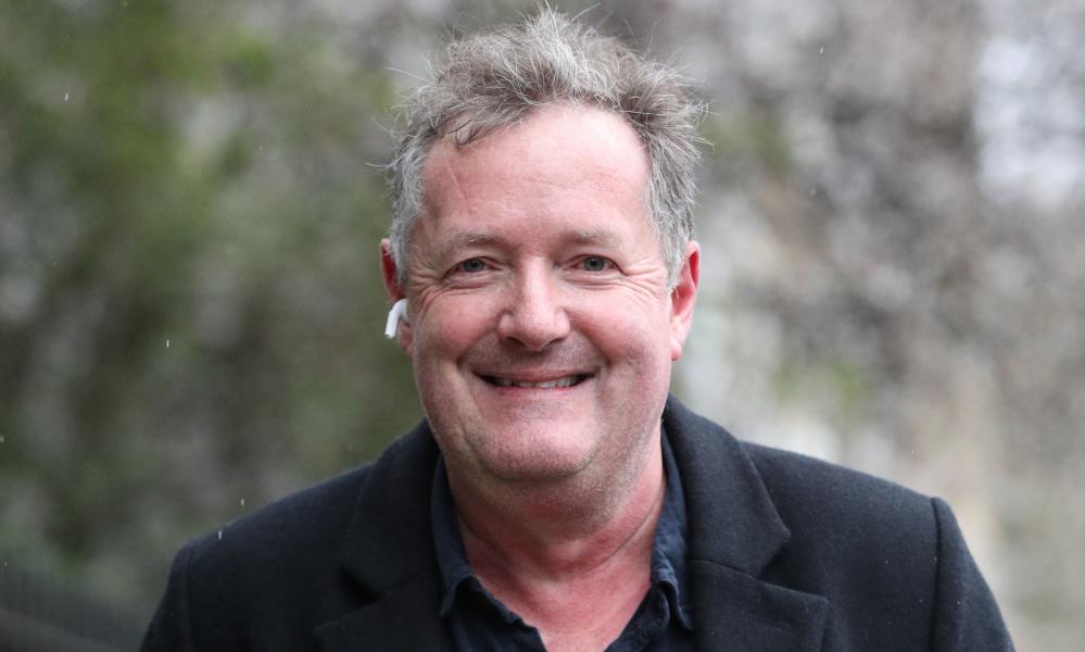 穿西装打领带的皮尔斯·摩根(Piers Morgan)对着镜头微笑:照片:乔纳森·布雷迪(Jonathan Brady)/ PA