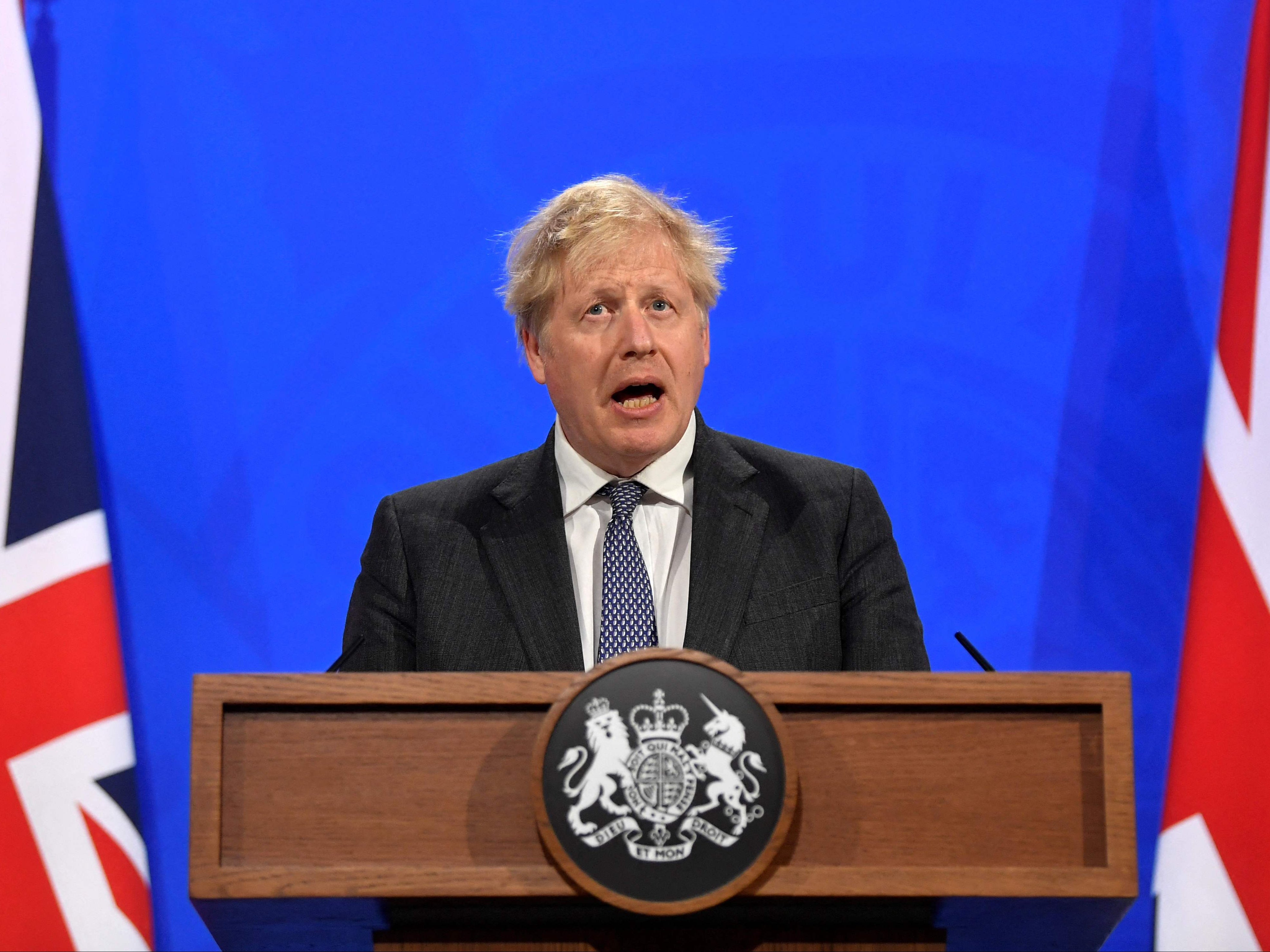 鲍里斯·约翰逊(Boris Johnson)穿着西装和领带:鲍里斯·约翰逊(Boris Johnson)发誓要通过Getty Images停止移动POOL / AFP